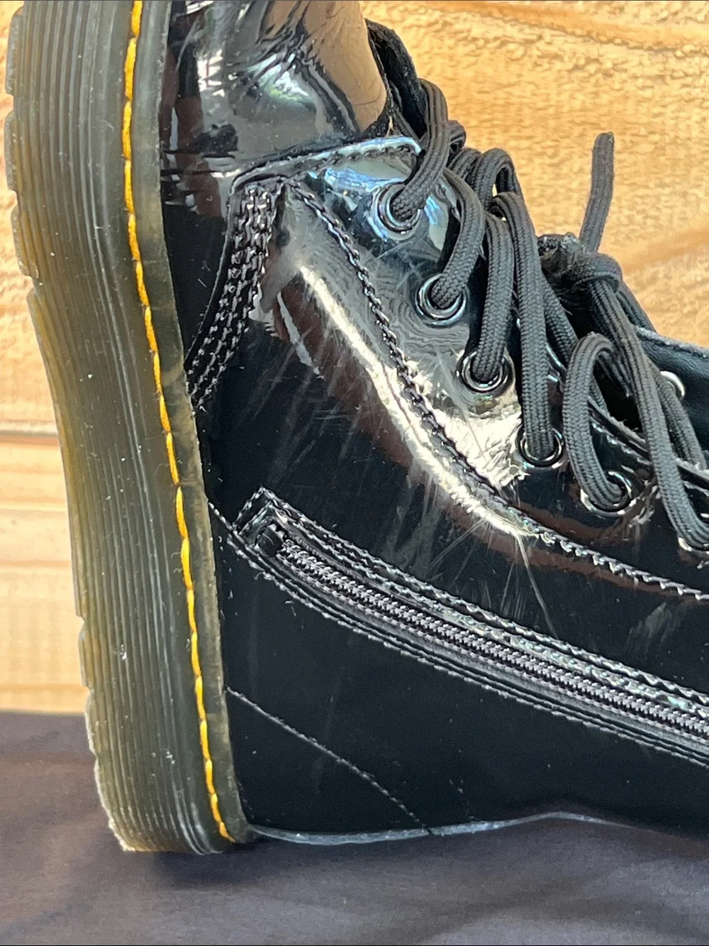 Dr. Martens Kids Black Patent Lace-Up Zip Combat Boots with Yellow Stitching